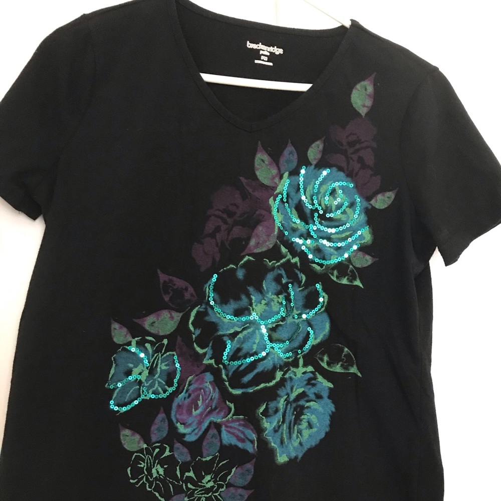 Breckinridge floral top w/ sequin details.
